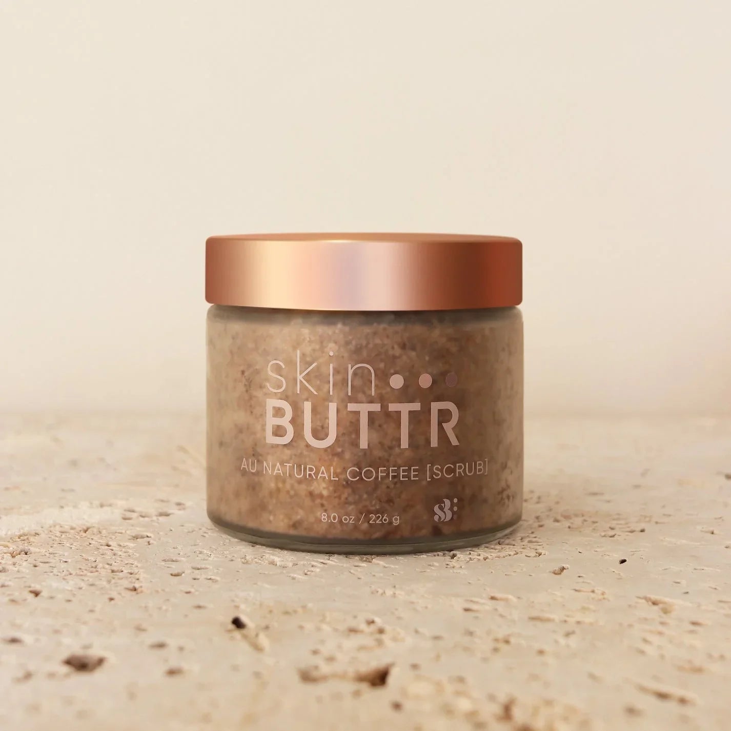 Au Natural Coffee Scrub in glass jar – exfoliating body scrub
Coffee and sugar blend in jar – natural body polish
Hand applying scrub to arm – fragrance-free exfoliating scrub
Coffee scrub texture close-up – gentle body exfoliant for women