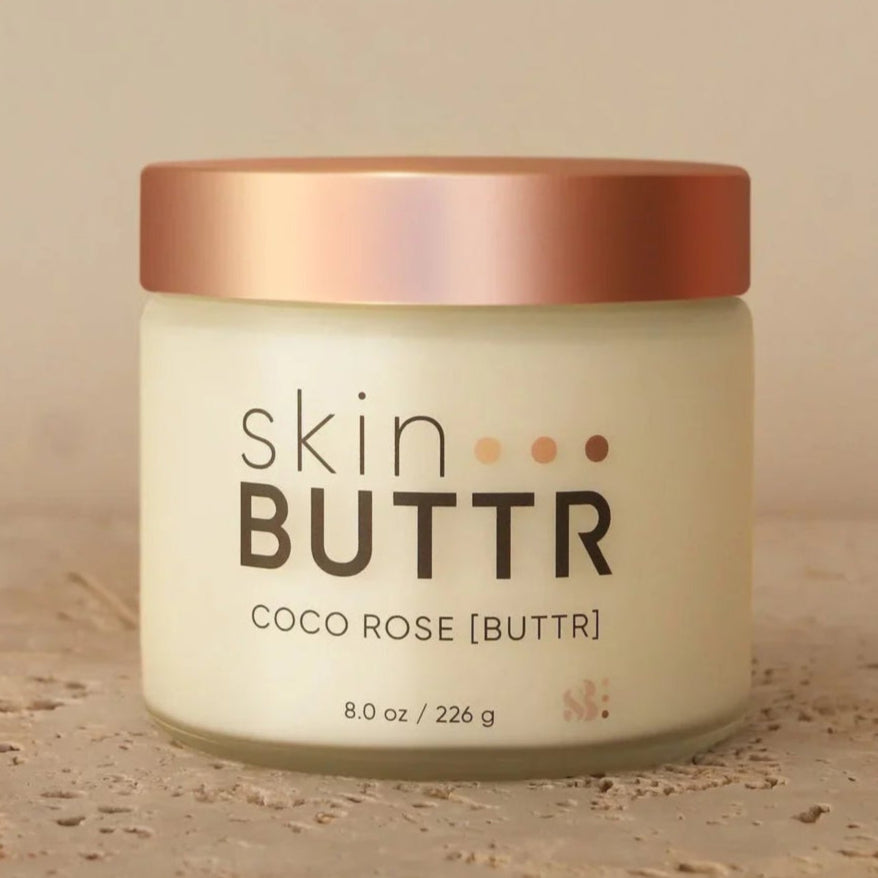 Jar of 'skin BUTTR' Coco Rose on a beige background