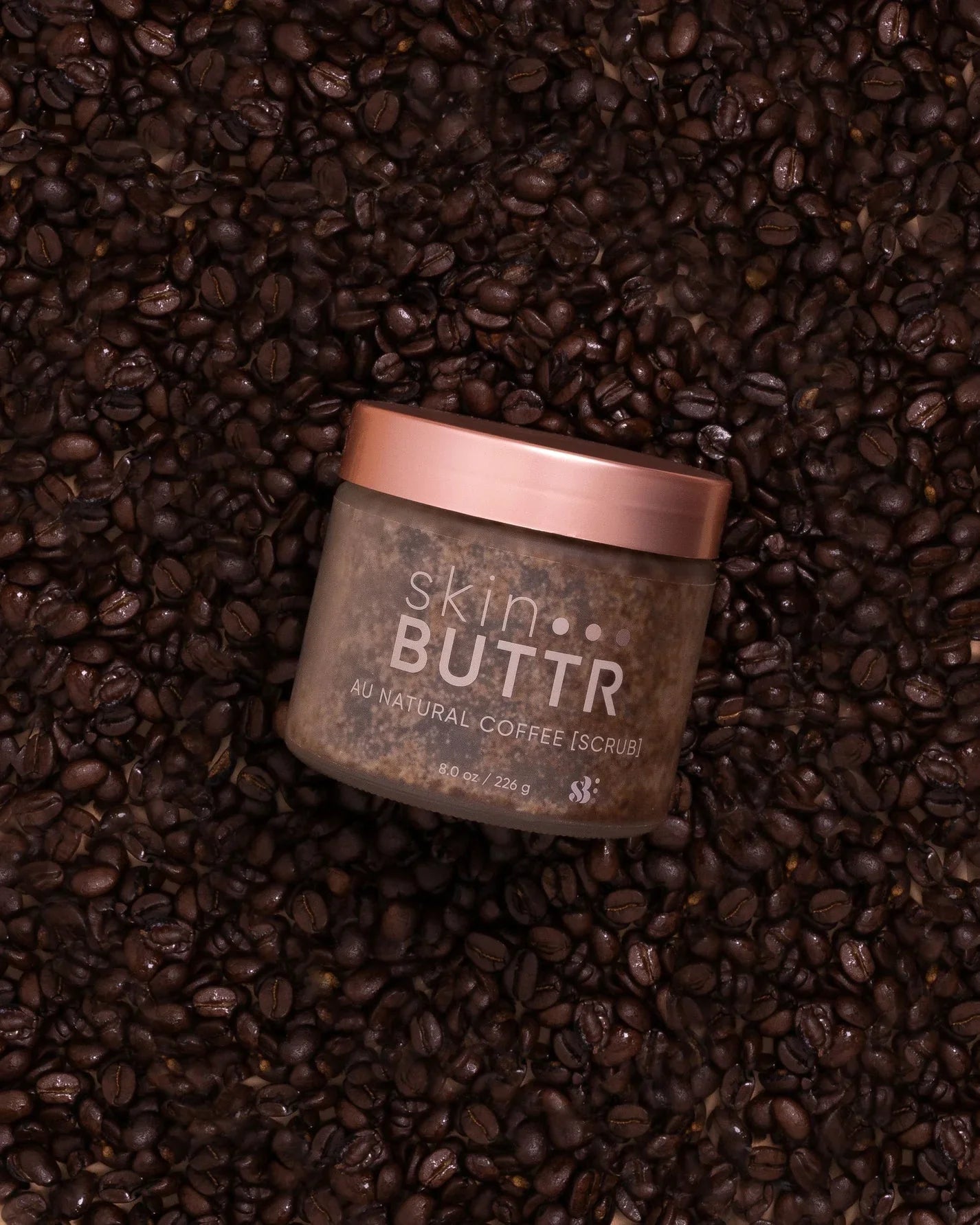 Au Natural Coffee Scrub in glass jar – exfoliating body scrub
Coffee and sugar blend in jar – natural body polish
Hand applying scrub to arm – fragrance-free exfoliating scrub
Coffee scrub texture close-up – gentle body exfoliant for women