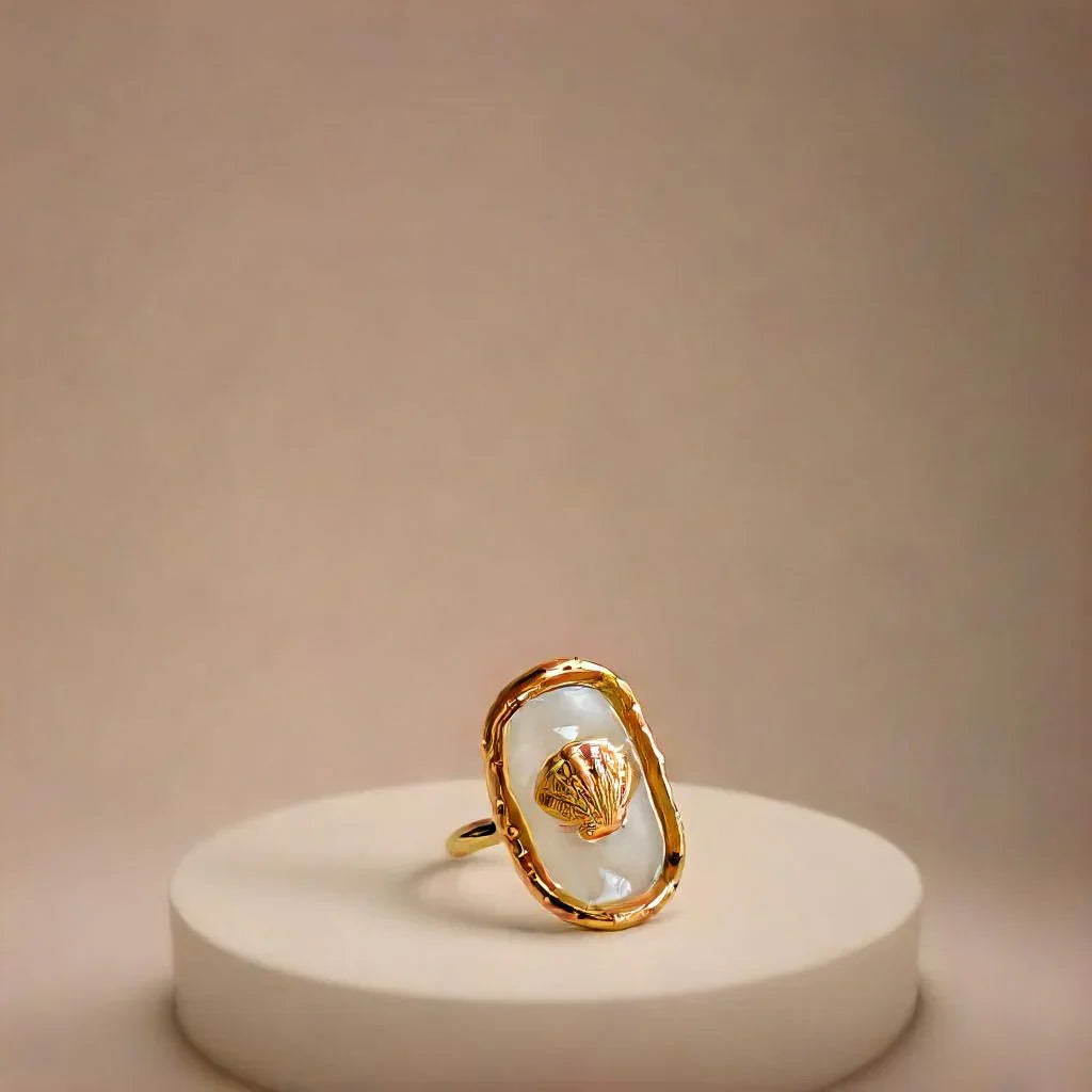 Close-up of women gold ring with hammered seashell design – Éclat Océan Doré
Side angle showcasing adjustable gold band ring for women with 18k plating
Lifestyle image of women gold ring with seashell motif, worn with casual outfit
Detailed shot of gold bands for women with ocean-inspired texture