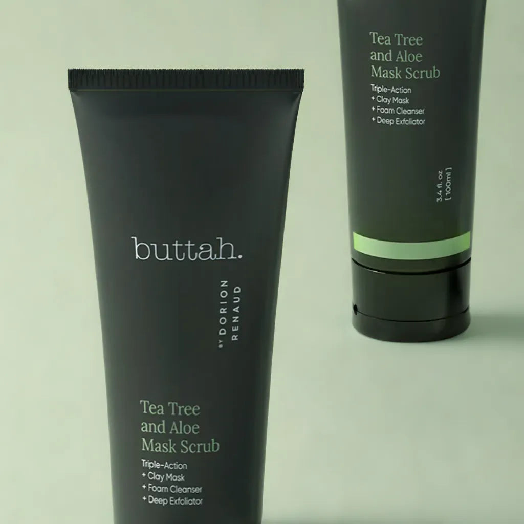 Exfoliating scrub swatched on skin
Mask being rinsed off with water
Flatlay with scrub, tea tree leaves, and aloe
Smooth glowing skin after use