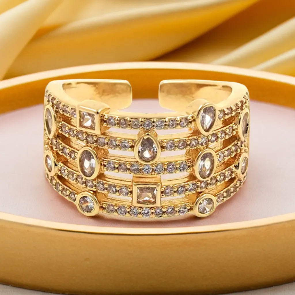 gold wide band CZ ring close up
adjustable gold minimalist ring
dainty gold ring with cubic zirconia
women’s adjustable gold open ring