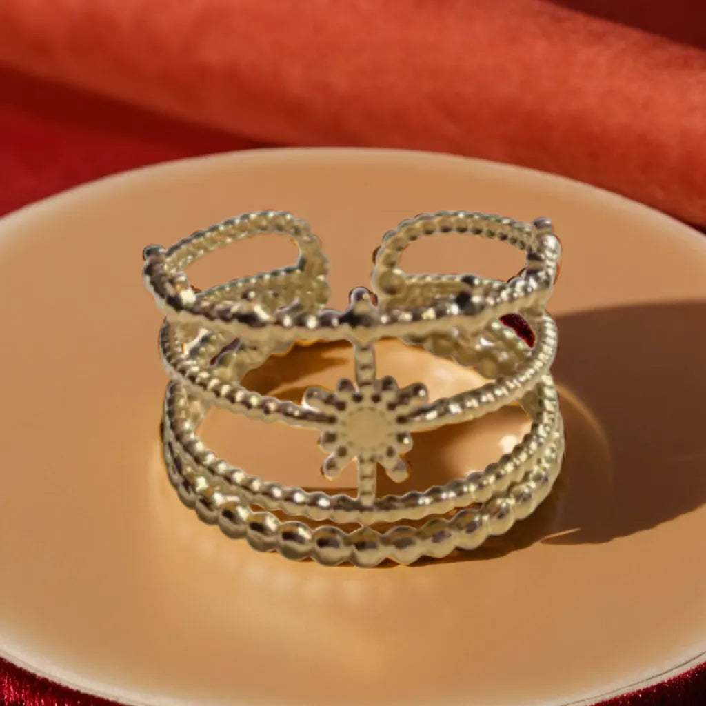 Anneaux Célestes – Celestial Gold Adjustable Ring
Celestial-inspired 4-layer gold ring with adjustable band. 18K plated, water-resistant & hypoallergenic. A cosmic statement for dreamers & stargazers.
Gold celestial ring – 4-layer design for women
Adjustable 18K gold ring inspired by stars and moons
Elegant celestial statement ring – Anneaux Célestes