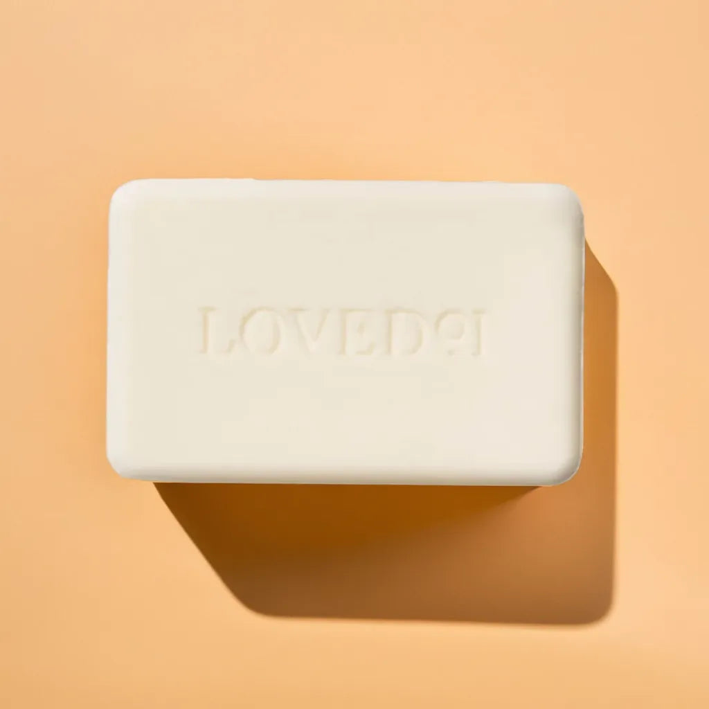 Cleansing bar with rich lather – face and body soap for all skin types
Natural soap bar with packaging – cedar citrus scented
Plant-based skincare ingredients – shea butter, jojoba oil, green tea
Hand holding cleansing bar – moisturizing bar soap for sensitive skin