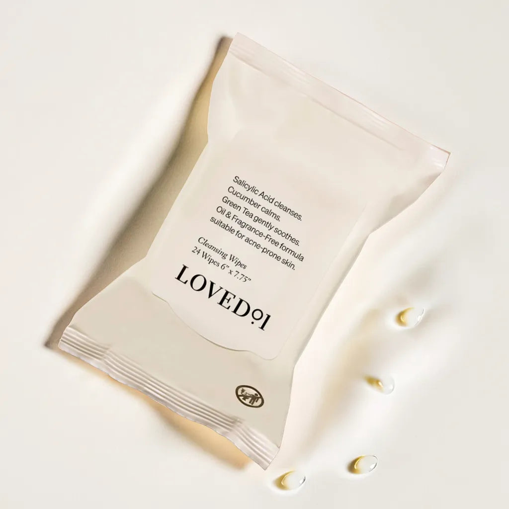 Pack of exfoliating facial wipes – salicylic acid and papaya blend
Woman using face wipe post-gym – refreshing cleanse
Close-up of wipe texture – gentle exfoliation
Flat lay with ingredients – green tea, cucumber, papaya