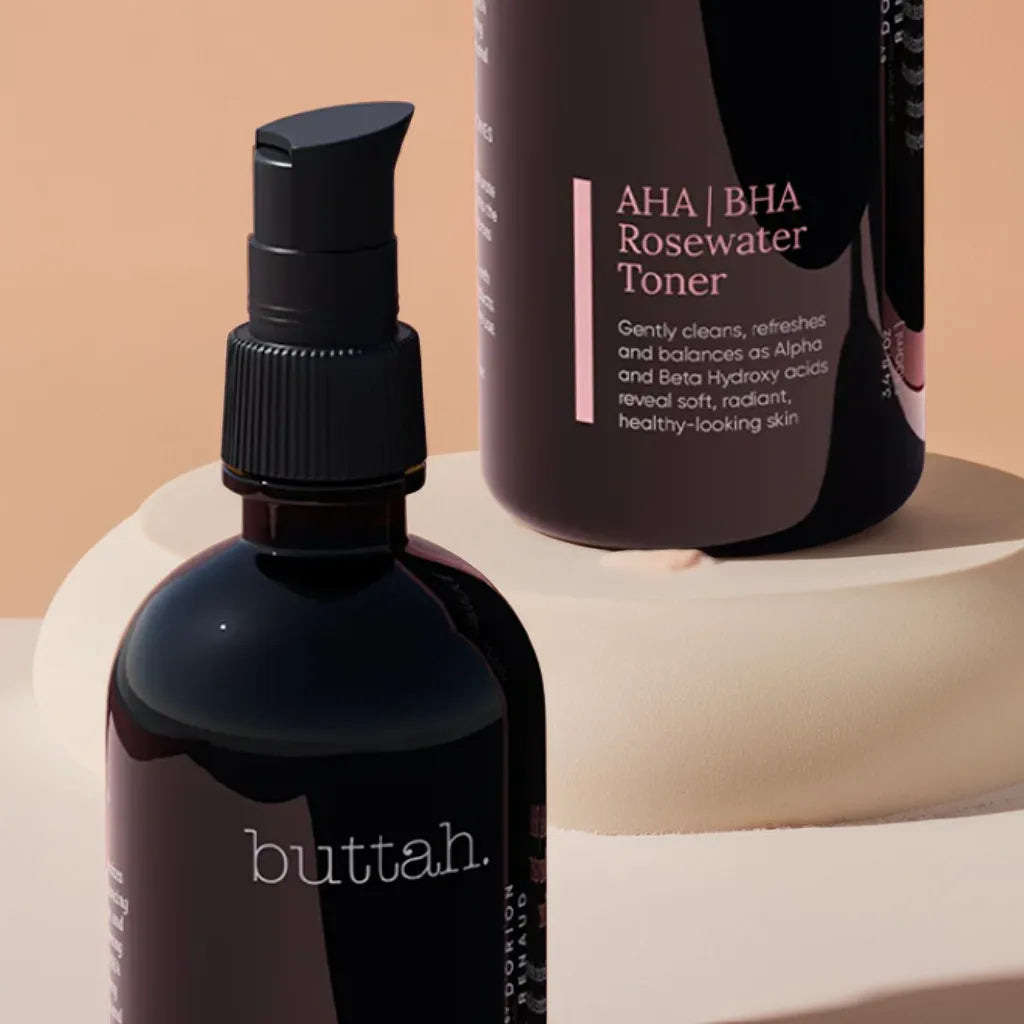 Rosewater toner bottle with dewy droplets
Toner and rose petals styled on a bathroom tray
Pouring toner onto cotton pad
Woman patting toner into glowing skin