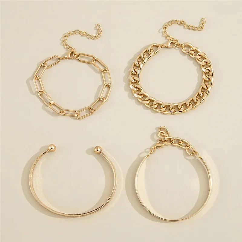 Radiance Noire Miami Based Online Jewelry store selling 4 Pcs Set Punk Gold Color Layered Chain Cuban Bracelets For Women Charm Cuff Bangle