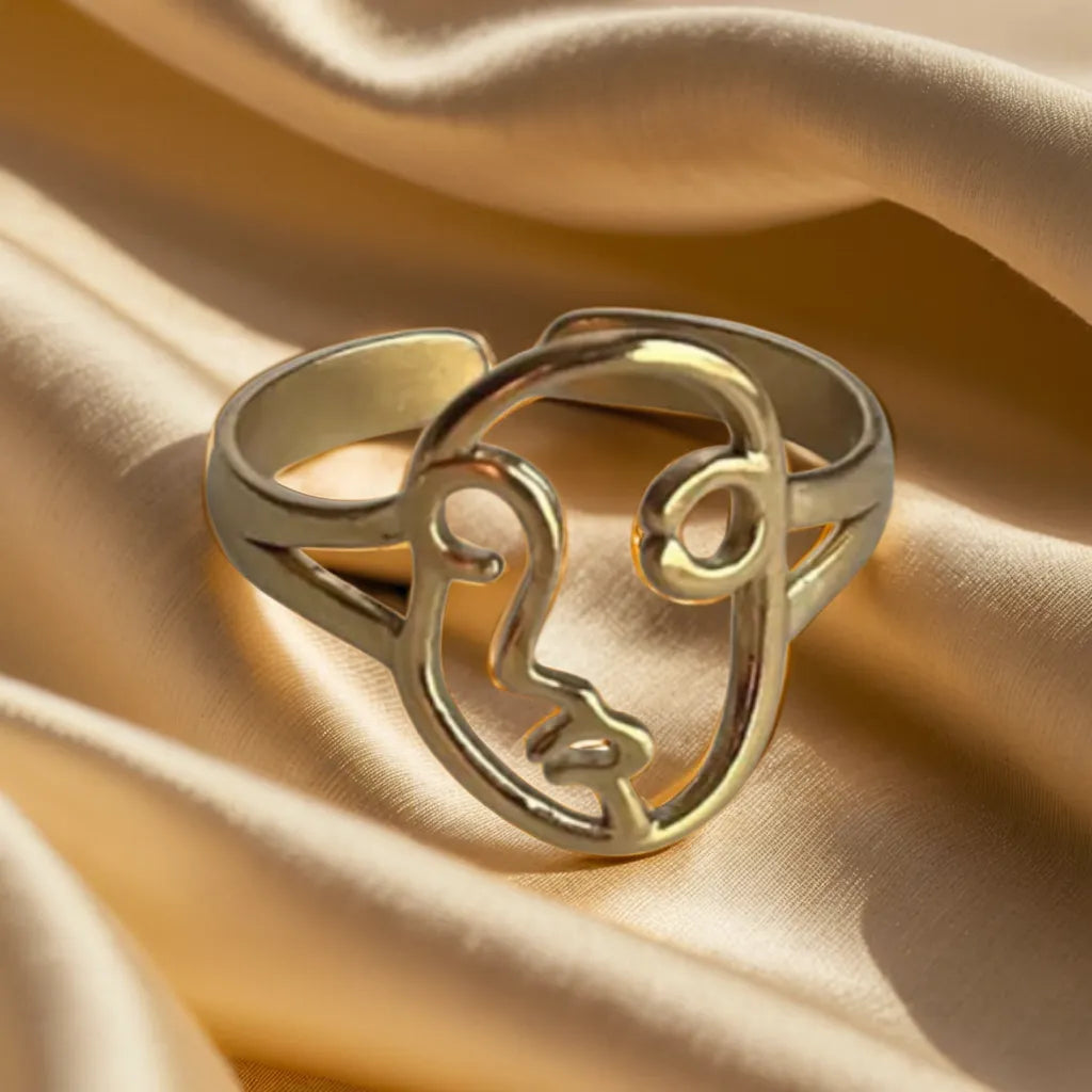 minimalist face gold ring
adjustable abstract ring for women
18k gold plated silhouette ring
artistic modern gold ring close u