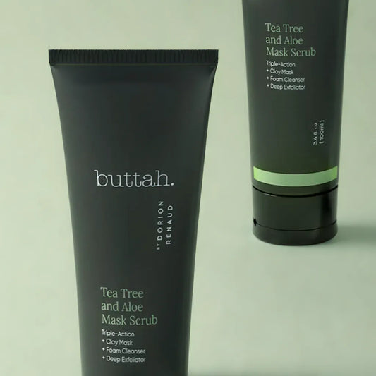 Exfoliating scrub swatched on skin
Mask being rinsed off with water
Flatlay with scrub, tea tree leaves, and aloe
Smooth glowing skin after use