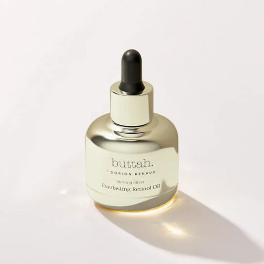 "Huile de Nuit au Rétinol bottle – brightening overnight oil"

"Luxury retinol oil dropper – for dark spots and fine lines"

"Radiance Noire Huile de Nuit au Rétinol packaging"

