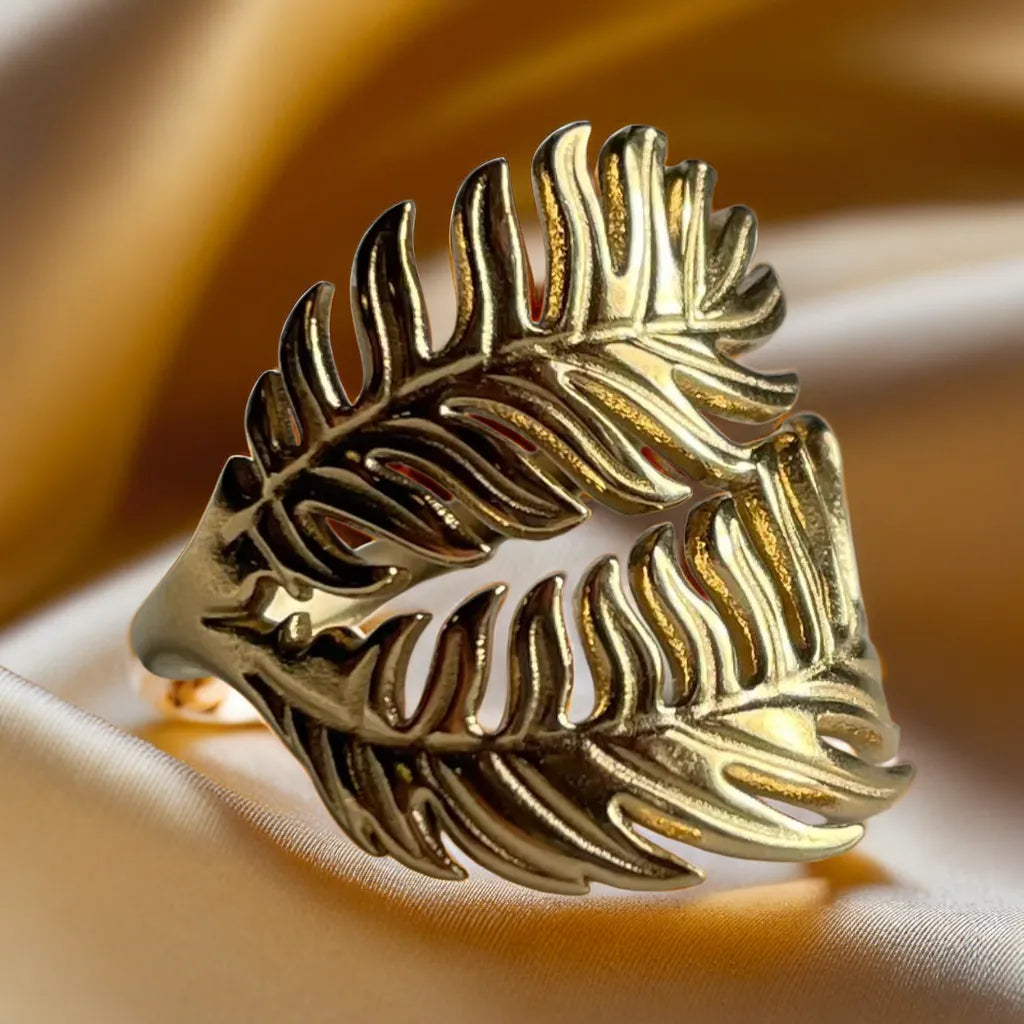 “Palm Leaf Gold Ring – 18k gold plated adjustable ring for women”
“Tropical palm leaf gold ring – close-up design”
“Women’s gold ring – 18k gold plated palm leaf motif”
“Adjustable gold ring for women – tropical jewelry piece”