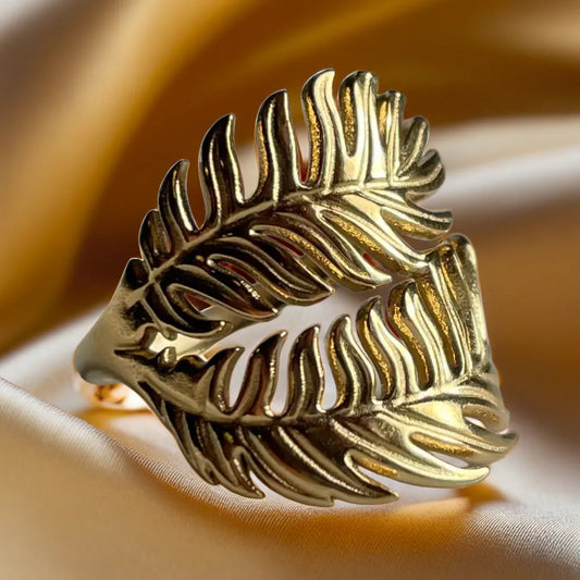 “Palm Leaf Gold Ring – 18k gold plated adjustable ring for women”
“Tropical palm leaf gold ring – close-up design”
“Women’s gold ring – 18k gold plated palm leaf motif”
“Adjustable gold ring for women – tropical jewelry piece”