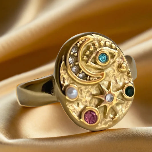 “Bague Étoilée Stardust Bloom – women’s gold plated ring, front view”

“Celestial inspired gold ring for women – side profile”

“Stardust Bloom 18k gold plated ring – flat lay on neutral background”

“Elegant women’s gold plated ring – worn on hand, lifestyle photo