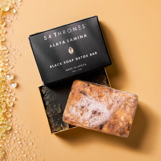 Alata Samina Black Soap Bar – natural African detox soap
Black soap lather – clarifying cleanser for face and body
Soap on soap dish – plant-based black detox bar
Close-up texture – handmade Ghanaian black soap