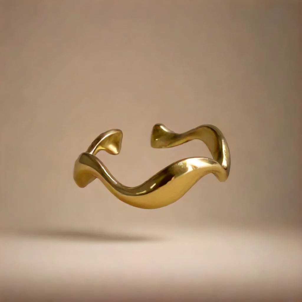 Gold Wave Ring for Women – Anneau Vague Dorée | Radiance Noire

Elegant gold wave ring for women in 18K gold plated stainless steel. Adjustable fit, modern silhouette—perfect for stacking or wearing solo with chic sophistication.

Wave-shaped gold ring for women – close-up
Elegant fluid gold ring with adjustable fit
18K gold plated minimalist wave ring
Anneau doré vague – design moderne et raffiné