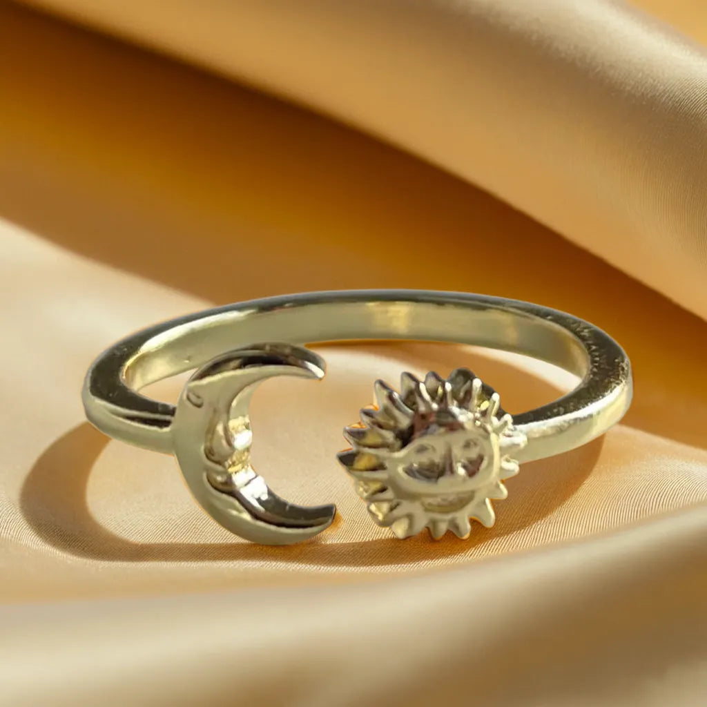 “Sun & Moon Ring – 18k gold plated adjustable women’s ring”
“Celestial gold plated ring for women – Sun and Moon design close-up”
“Adjustable women’s gold ring – Sun & Moon side view”
“Gold ring for women with Sun and Moon design – worn on hand”