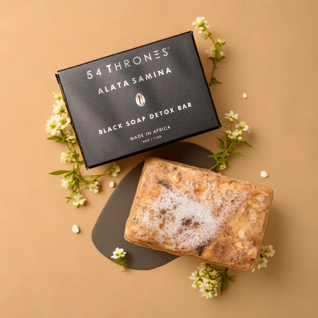 Alata Samina Black Soap Bar – natural African detox soap
Black soap lather – clarifying cleanser for face and body
Soap on soap dish – plant-based black detox bar
Close-up texture – handmade Ghanaian black soap