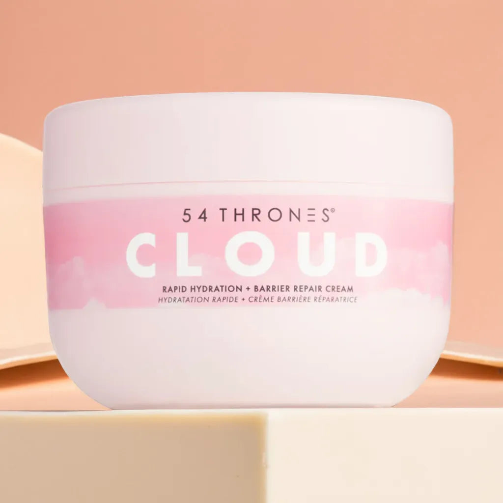 Jar of Kenyan Hibiscus + Moroccan Rose Cloud Cream – natural body lotion
Cream texture swatch – hydrating body cream for dry skin
Model applying lotion – non toxic lotion for glowing skin
Flat lay – floral scented body lotion with barrier repair ingredients