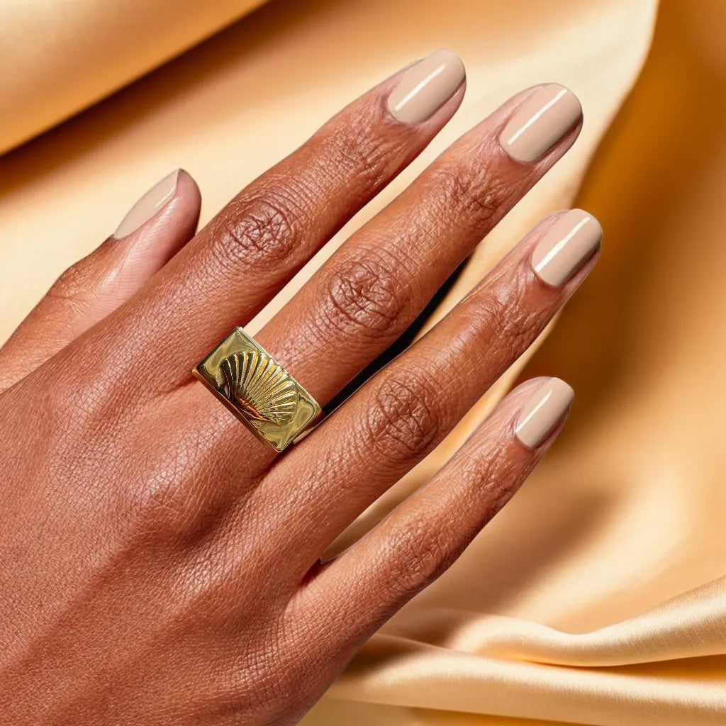 “Mermaid’s Window Ring – 18k gold plated women’s ring size 7 & 8”
“Gold plated ring for women – close-up of Mermaid’s Window design”
“Women’s gold ring – ocean inspired design on hand”
“18k gold plated ring – elegant light reflection detail”