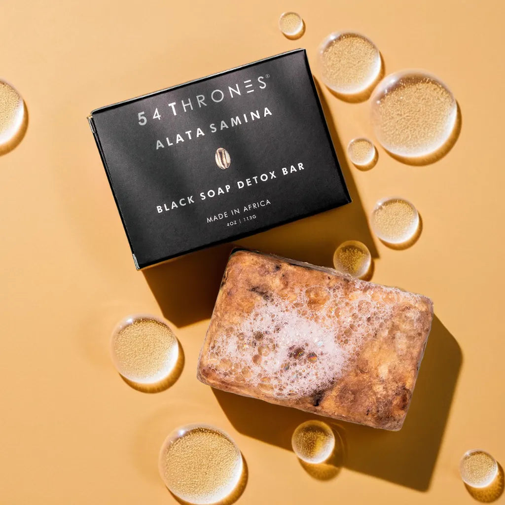 Alata Samina Black Soap Bar – natural African detox soap
Black soap lather – clarifying cleanser for face and body
Soap on soap dish – plant-based black detox bar
Close-up texture – handmade Ghanaian black soap
