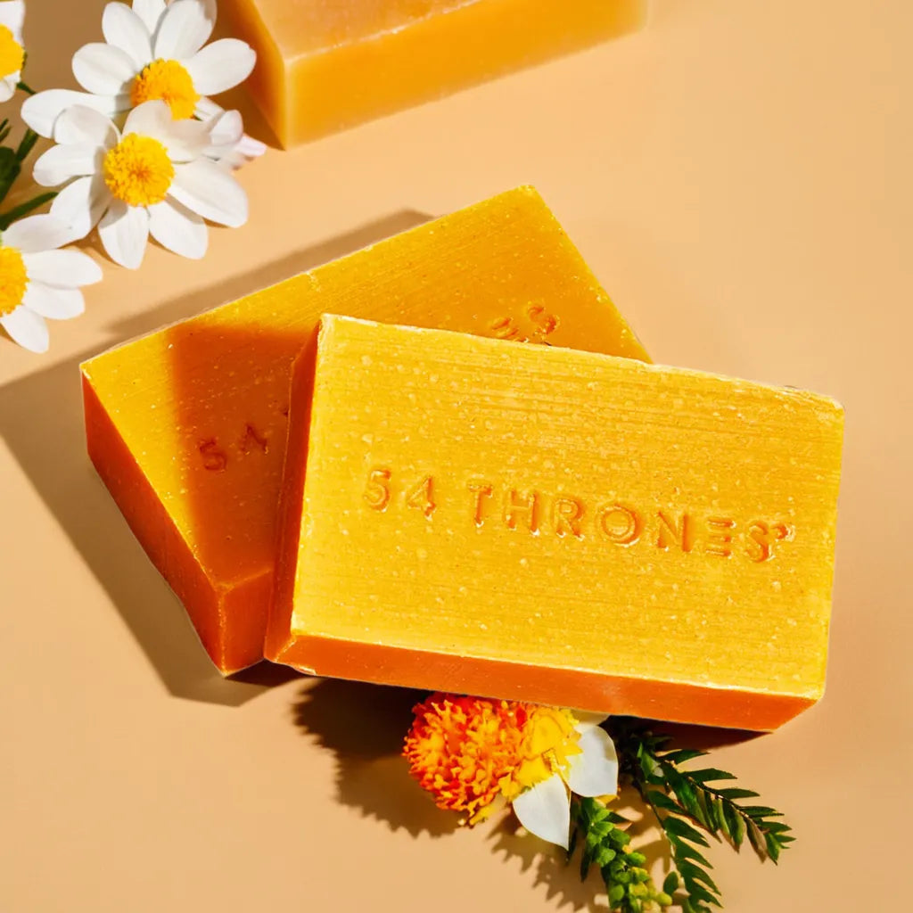 Turmeric Glow Bar – turmeric facial soap for even skin tone
Lathered bar in hand – natural face cleanser with turmeric
Soap on dish with herbs – turmeric and lavender facial soap
Close-up texture – brightening turmeric cleansing bar
