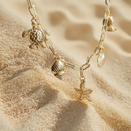 Collier Charme Océanique – Gold Ocean Necklace | Radiance Noire

Elevate your style with this 18k gold-plated ocean charm necklace. Featuring seashell and coastal accents, it’s a refined, beach-inspired statement for women who love the sea.

Gold ocean charm necklace
Collier coquillage femme plaqué or
Beach-inspired necklace for women
Ocean-themed gold jewelry piece