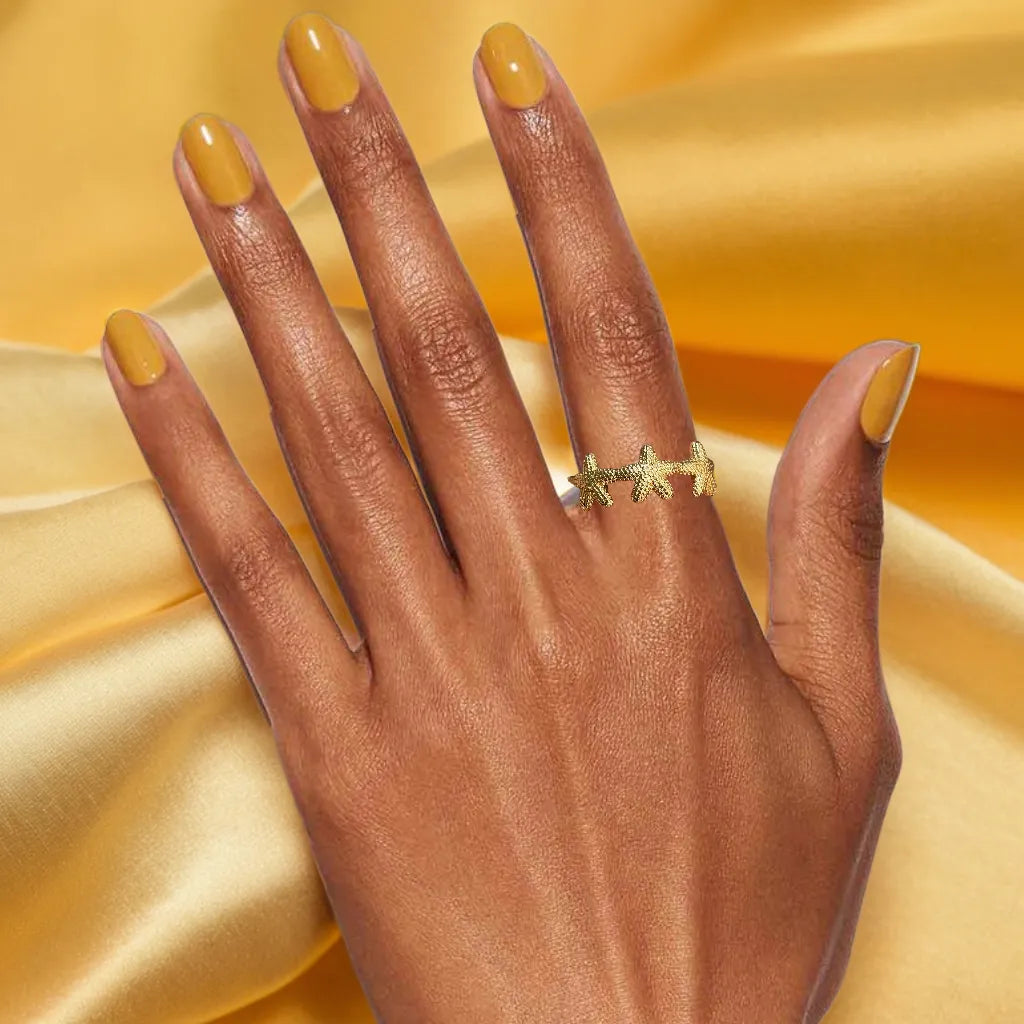 “Ocean Muse Ring – 18k gold plated adjustable women’s starfish ring”
“Gold plated starfish ring for women – Ocean Muse side view”
“Adjustable mini starfish gold ring – Ocean Muse jewelry detail”
“Women’s gold ring inspired by ocean starfish – worn on hand”