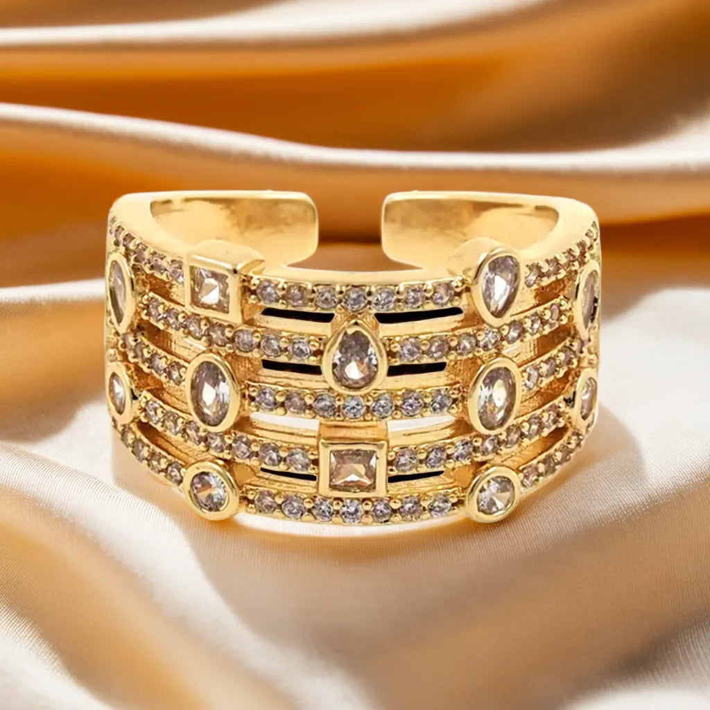 gold wide band CZ ring close up
adjustable gold minimalist ring
dainty gold ring with cubic zirconia
women’s adjustable gold open ring