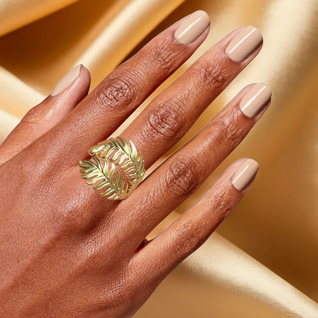 “Palm Leaf Gold Ring – 18k gold plated adjustable ring for women”
“Tropical palm leaf gold ring – close-up design”
“Women’s gold ring – 18k gold plated palm leaf motif”
“Adjustable gold ring for women – tropical jewelry piece”